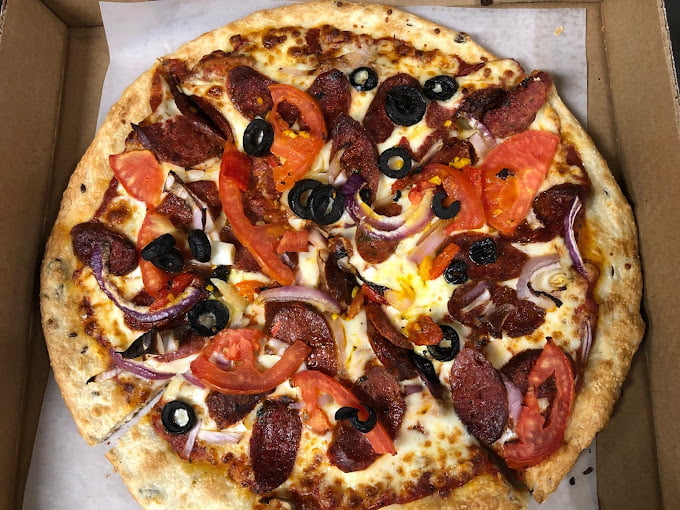 Deuxième Pizza à moitié prix